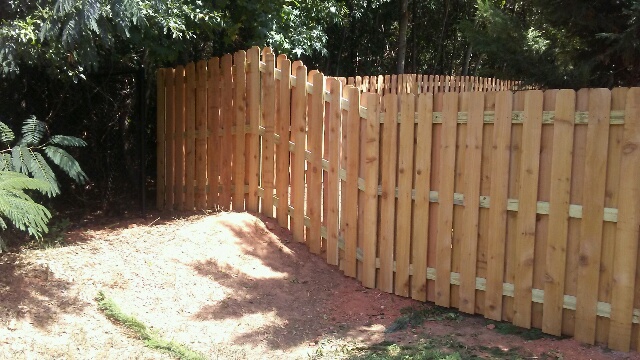 Cedar shadowbox fence installation showcasing McIntyre Fencing craftsmanship
