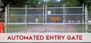Commercial-grade automated entry gates at a business facility providing controlled vehicle access